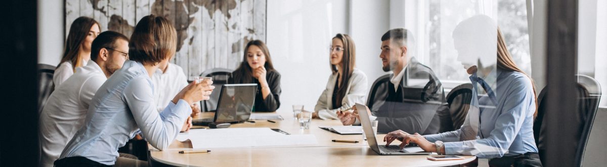 Group of people working out business plan in an office